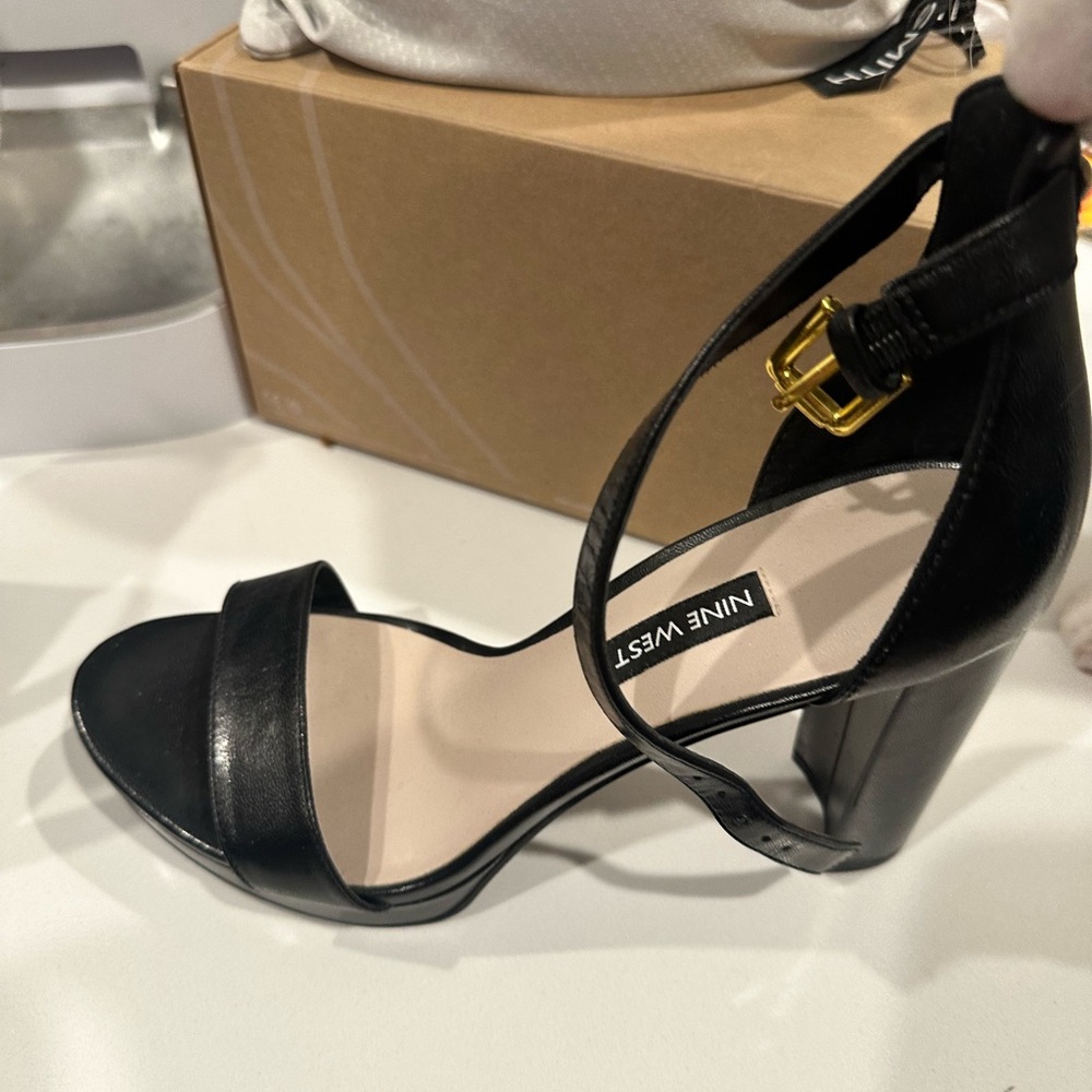 Brand new black classic nine west pumps. Size 7.5. Never worn.